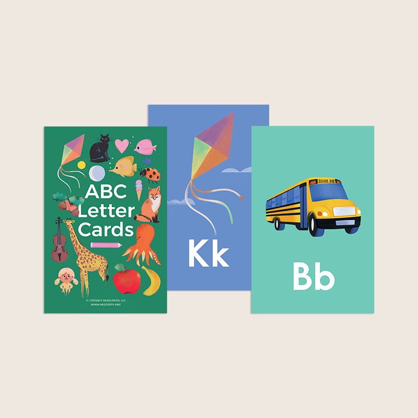   
Three Heggerty Bridge to Kindergarten alphabet cards shown together: one green card labeled “ABC Letter Cards” with small object illustrations, one blue card featuring the letter Kk and a kite, and one teal card featuring the letter Bb and a school bus.