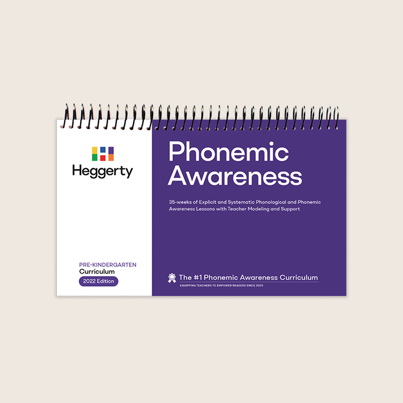 Cover of the Heggerty Pre-Kindergarten Phonemic Awareness Curriculum teacher manual, featuring a purple and white spiral-bound design with the Heggerty logo and the title Phonemic Awareness.