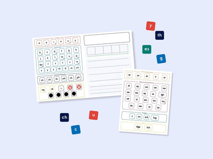 Heggerty phonics charts and magnetic alphabet letters used on activity boards for individual spelling and literacy practice.