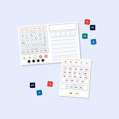 Color-coded magnetic phonics tiles and alphabet letters used with spelling activity sheets for small group instruction.