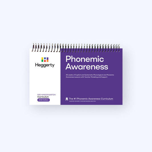 Heggerty Pre-Kindergarten Phonemic Awareness Curriculum 2022 Edition purple spiral-bound manual with 35 weeks of early listening and sound awareness lessons.